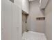 Bright laundry room with washer/dryer hookups and ample storage at 741 Fairway Ridge Ct, Sun City Center, FL 33573