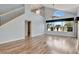 Bright living room, hardwood floors, and view to backyard at 741 Fairway Ridge Ct, Sun City Center, FL 33573