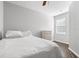 Bedroom with wood floors and dresser at 8003 Limestone Ln # 15-103, Sarasota, FL 34233