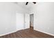 Spacious bedroom with double doors and wood floors at 8003 Limestone Ln # 15-103, Sarasota, FL 34233