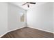 Simple bedroom with wood floors and window at 8003 Limestone Ln # 15-103, Sarasota, FL 34233