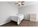 Small bedroom with wood floors and ceiling fan at 8003 Limestone Ln # 15-103, Sarasota, FL 34233