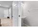 Clean powder room with pedestal sink and tile flooring at 8003 Limestone Ln # 15-103, Sarasota, FL 34233