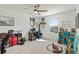 Cozy bedroom with work space, window, and built-in shelving at 9011 Waxwing Way, Parrish, FL 34219