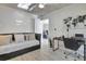 Multi-purpose bedroom with daybed and workspace at 1130 W Peppertree Ln # 118, Sarasota, FL 34242