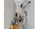 Small storage room with shelving and various items at 1130 W Peppertree Ln # 118, Sarasota, FL 34242