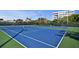 Two well-maintained tennis courts for residents' enjoyment at 1130 W Peppertree Ln # 118, Sarasota, FL 34242