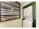 Stackable washer and dryer in a well-lit laundry closet at 147 Pinehurst Dr # 147, Bradenton, FL 34210