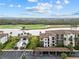 Luxury condo community boasting a resort-style pool, golf course views, and ample parking at 16904 Vardon Ter # 301, Bradenton, FL 34211