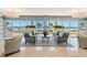 Inviting lobby seating area with comfortable couches, tables and ocean view at 1800 Benjamin Franklin Dr # A405, Sarasota, FL 34236