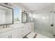 Modern bathroom with double vanity, large shower, and elegant tile at 1901 6Th E St, Palmetto, FL 34221