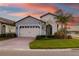 Curb appeal abounds at this charming one-story home, showcasing a two-car garage at 1901 6Th E St, Palmetto, FL 34221