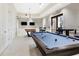 Game room with pool table and ping pong table at 1901 6Th E St, Palmetto, FL 34221