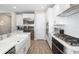 Spacious kitchen featuring stainless steel appliances and white shaker cabinets at 1901 6Th E St, Palmetto, FL 34221