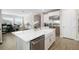 Modern kitchen with stainless steel appliances and white cabinetry at 1901 6Th E St, Palmetto, FL 34221