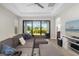 Relaxing living room featuring sliding glass doors and backyard view at 1901 6Th E St, Palmetto, FL 34221