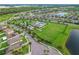 Aerial view showing community pool and neighborhood at 1964 Hawks View Dr, Ruskin, FL 33570