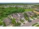 Aerial view of a house and neighborhood, highlighting the property's location at 1964 Hawks View Dr, Ruskin, FL 33570