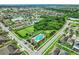 Community overview featuring pool, playground, and residential homes at 1964 Hawks View Dr, Ruskin, FL 33570
