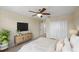 Comfortable bedroom featuring a queen-size bed and ample closet space at 1964 Hawks View Dr, Ruskin, FL 33570