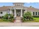 Community center entrance with columns and landscaping at 1964 Hawks View Dr, Ruskin, FL 33570