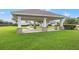 Relaxing gazebo near the community pool, offering shade and seating at 1964 Hawks View Dr, Ruskin, FL 33570
