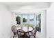 Breakfast nook with water views surrounded by big windows at 2271 Sandlewood Dr, Venice, FL 34293