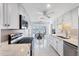 Breakfast nook with water views, white trim and granite countertops at 2271 Sandlewood Dr, Venice, FL 34293