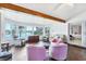 Open living area with water views from large window, and seating area at 2271 Sandlewood Dr, Venice, FL 34293
