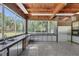 Bright kitchen featuring white cabinets and granite countertops with lots of natural light at 2605 Desoto Rd, Sarasota, FL 34234