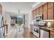 Cozy kitchen with a view of outdoor dining space, and modern appliances at 2605 Desoto Rd, Sarasota, FL 34234