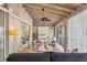 Stylish sunroom showcases modern furnishings, vaulted ceilings, and views into an adjacent bedroom at 2605 Desoto Rd, Sarasota, FL 34234