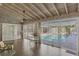 Relaxing sunroom with vaulted ceilings, view of the pool, and sliding glass doors at 2605 Desoto Rd, Sarasota, FL 34234