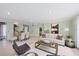 Open living room with a dining area offers comfortable seating and plenty of natural light at 2605 Desoto Rd, Sarasota, FL 34234