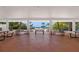 Pavilion with multiple picnic tables and open view to the beach and surrounding greenery at 3260 Bayou Rd, Longboat Key, FL 34228
