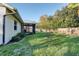 Backyard features a screened patio and grassy area at 4532 N Shade Ave, Sarasota, FL 34234