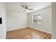 Well-lit bedroom with hardwood floors and a ceiling fan at 4532 N Shade Ave, Sarasota, FL 34234