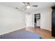 Bright bedroom featuring hardwood floors and built-in closet at 4532 N Shade Ave, Sarasota, FL 34234