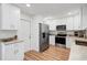 Modern kitchen with stainless steel appliances and granite countertops at 4532 N Shade Ave, Sarasota, FL 34234