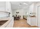 Bright kitchen with granite countertops and adjacent dining area at 4532 N Shade Ave, Sarasota, FL 34234