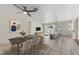 Bright living room and dining area with tiled flooring and natural light at 5164 Windward Ave, Sarasota, FL 34242