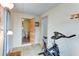 Small bathroom with toilet and exercise bike at 604 49Th Avenue W Dr, Bradenton, FL 34207