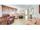 Inviting living room with comfortable seating, natural light, and neutral decor for easy personalization at 604 49Th Avenue W Dr, Bradenton, FL 34207
