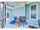 Relaxing screened porch with patio furniture at 604 49Th Avenue W Dr, Bradenton, FL 34207