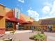 Modern movie theater entrance with ticket booth at 7131 Sandhills Pl, Lakewood Ranch, FL 34202