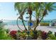 Landscaped grounds with water views and art at 988 Blvd Of The Arts # 1016, Sarasota, FL 34236