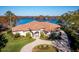 Aerial view of home with circular driveway at 9903 Menander Wood Ct, Odessa, FL 33556