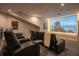 Home theater with plush seating, large screen, and surround sound at 1541 Bay Point Dr, Sarasota, FL 34236