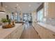 Bright, spacious kitchen with marble counters, stainless appliances, and an island at 1541 Bay Point Dr, Sarasota, FL 34236