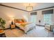 Comfortable main bedroom with stylish decor, natural light, and calming color scheme at 1541 Bay Point Dr, Sarasota, FL 34236